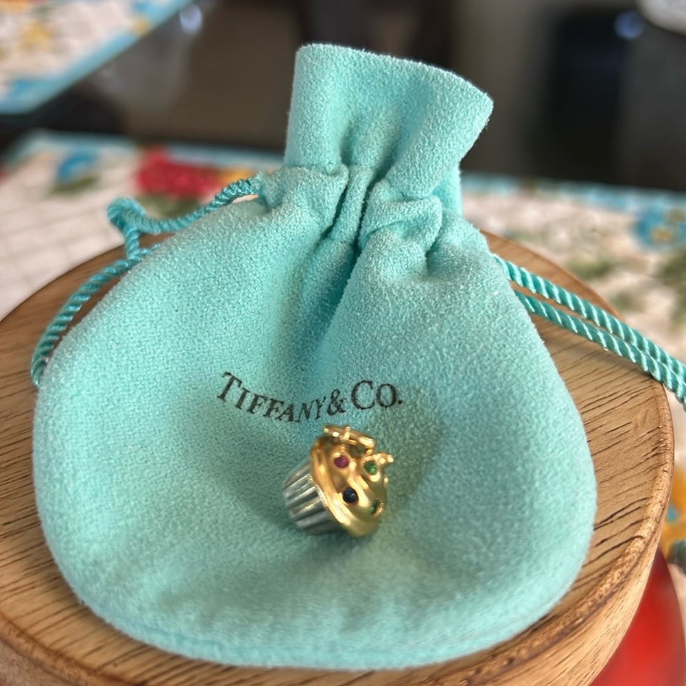 Tiffany gold/platinum cupcake charm.
